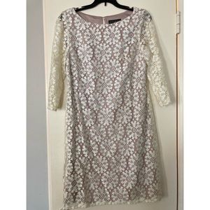 Ivory quarter length sleeve cocktail dress